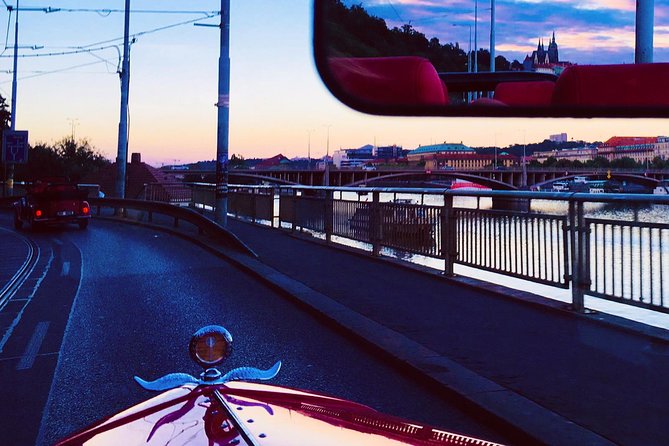 1,5 hour oldtimer convertible Prague sightseeing tour - Charles Bridge and the riverfront view