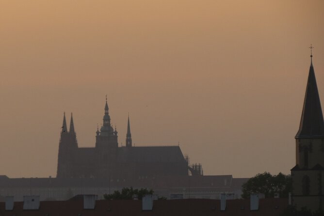Charles Bridge and Prague Castle Walking Tour - Taking the tram toward Prague Castle