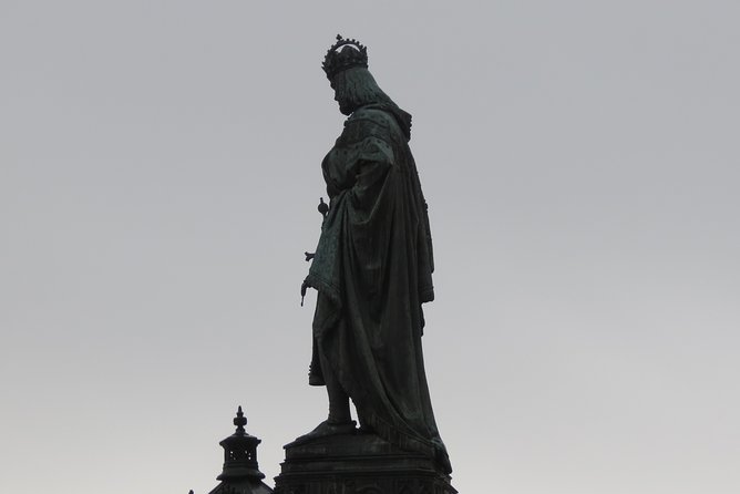 Charles Bridge and Prague Castle Walking Tour - Crossing Charles Bridge with more than a photo stop