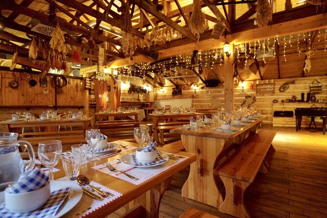 Folk Dinner Experience in Prague with Transportation - The folk performance: costumes, instruments, and audience dancing