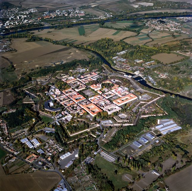 From Prague: All-inclusive Bus Tour to Terezin Memorial - Terezin town and its empty buildings
