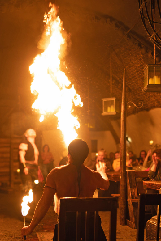 From Prague: Medieval Dinner, Show, Castle and Brewery - Music, dancers, fakirs, and a fiery finish