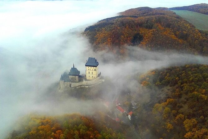 From Prague: Small-Group Karlstejn Castle & Koneprusy Caves Trip - Leaving Prague for Bohemian stone and royal history