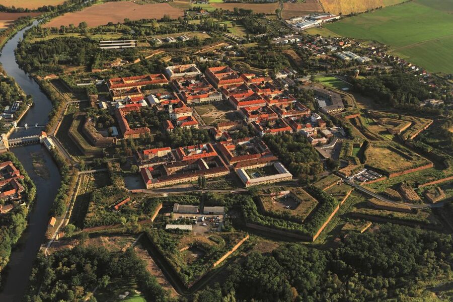 From Prague: Terezín and Ghetto Museum Guided Tour - Entering the Small Fortress and former Gestapo prison