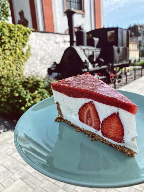 From Prague: Terezin Camp and Bohemian Switzerland Day Trip - Litomerice coffee, pastries, and medieval streets