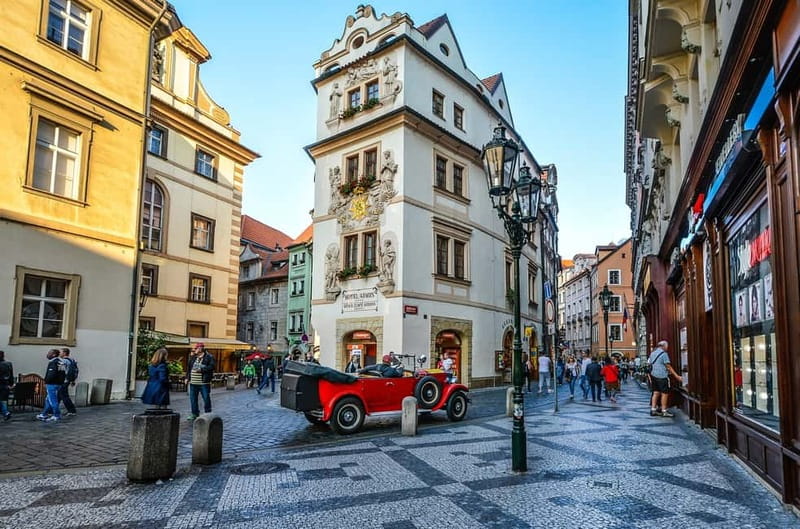 From Vienna: Full-Day Trip to Prague - Prague’s riverfront and National Theatre