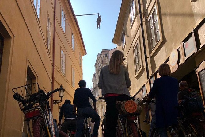Full-Day All-in-One Electric Bike Tour of Prague (7hrs) - Lennon Wall and David Cerny’s unusual sculptures