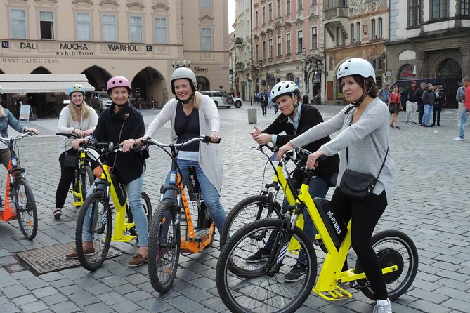 Grand City Tour of Prague on Cruiser e-Bikes or e-Scooters - Kampa Island, the Lennon Wall, and Charles Bridge