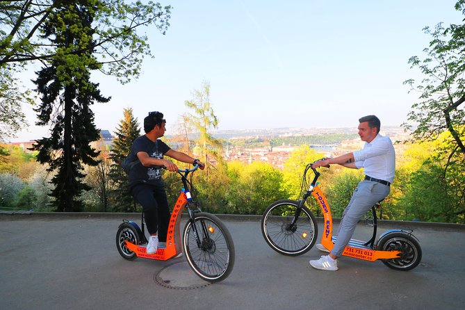 Grand City Tour of Prague on Cruiser e-Bikes or e-Scooters - Kafka’s moving statues and the Rudolfinum