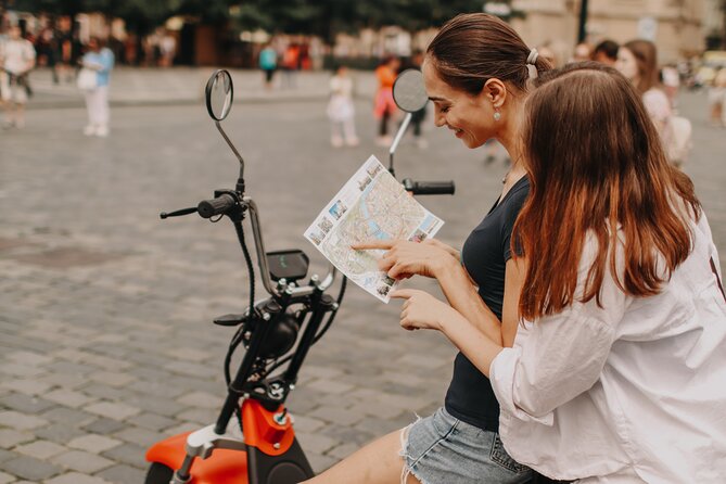 Guided sightseeing e-scooter tour of Prague: 2 hours - Chotek Gardens and the approach to Prague Castle