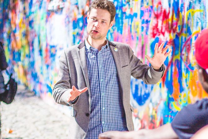 Historical Prague Guided E-Bike Tour - Lennon Wall and the story behind the paint