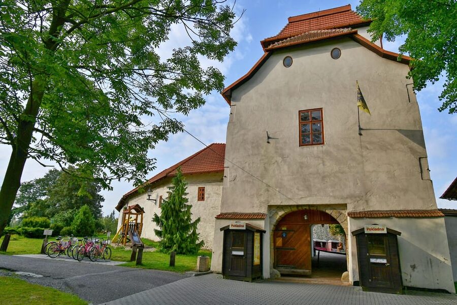 Ostrava: Entrance to Silesian Ostrava Castle - Green grounds, deck chairs, and the amphitheater