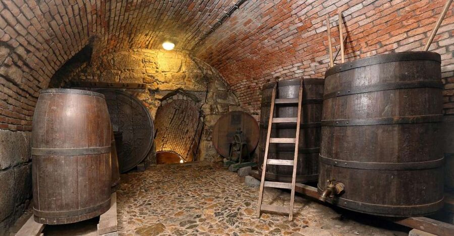 Pilsen: Brewery Museum Entrance with a Glass of Beer - Medieval cellars and the older way to drink beer