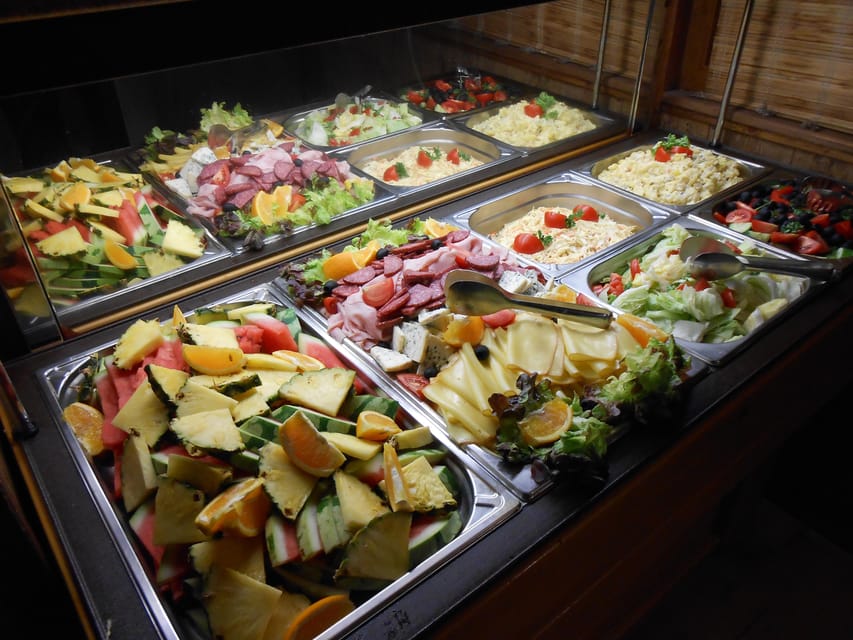 Prague: 1-hour Cruise with Audio Guide - A warm drink, a snack, and a practical hour