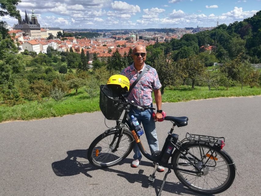 Prague: 3–Hour Communism and World War 2 E-Bike Tour - John Lennon Wall and the Kafka Museum