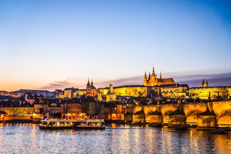 Prague: 50-Minute Sightseeing Evening Cruise - Indoor comfort versus upper-deck photos