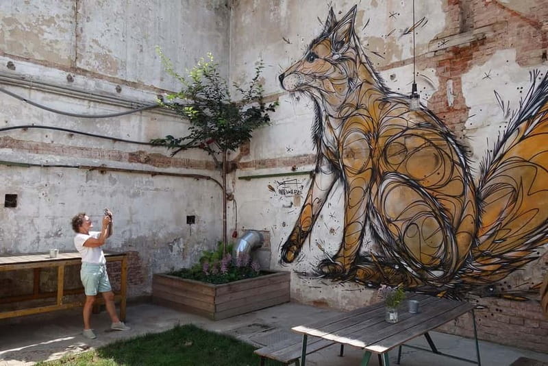 Prague: Alternative Prague Walking Tour - The former factory with fashion, murals, and gin