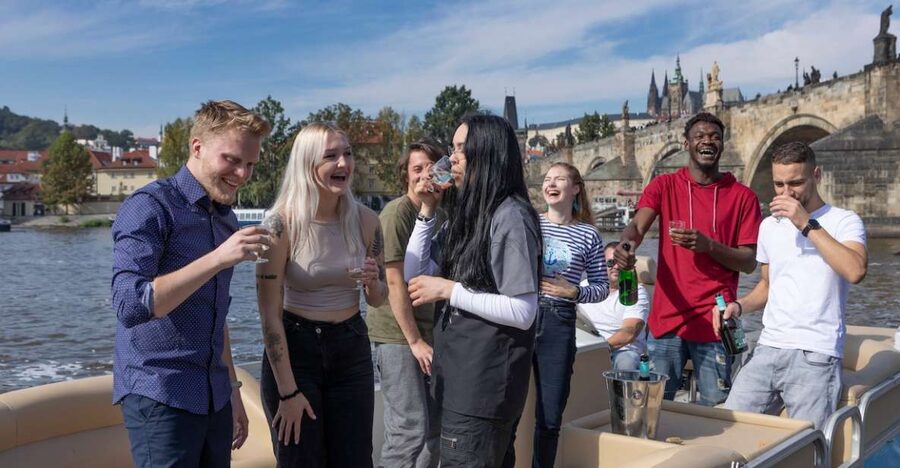 Prague: Beer Boat Tour - Meeting the boat between two river landmarks