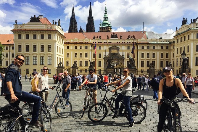 Prague Bike Tour - Stunning Viewpoints, Castle, City & Park - Returning through the National Theater and New Town