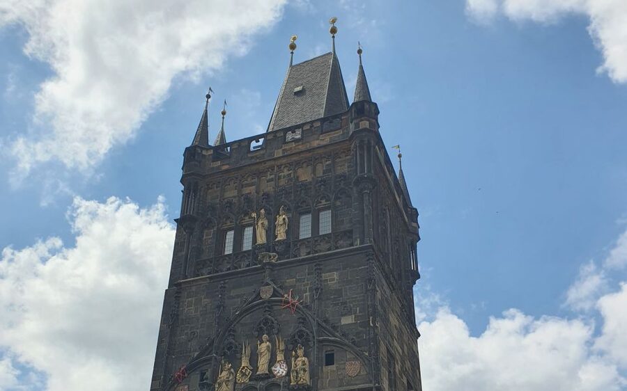 Prague: Charles Bridge Audio Guide with Tower Entry Ticket - Following Charles Bridge through Prague’s royal past