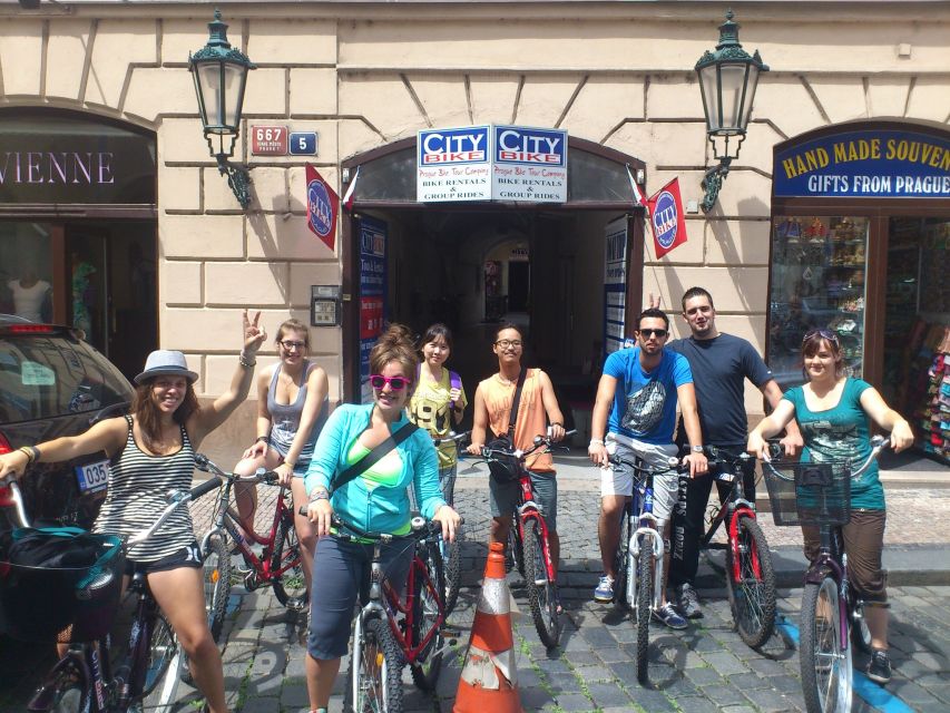 Prague City Bike guided tour - Crossing the Vltava on Charles Bridge