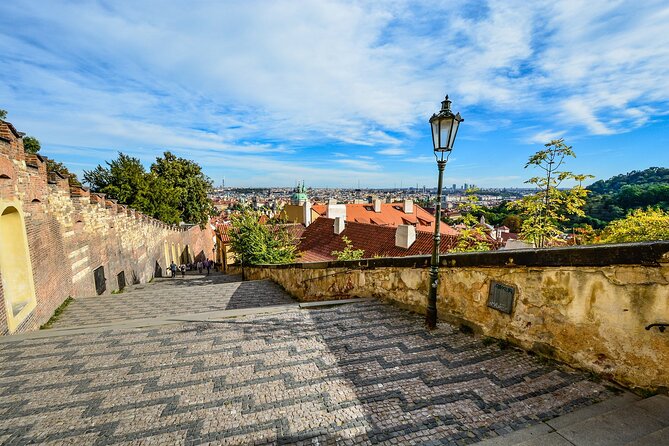 Prague DeLuxe Tour: Views, Hidden Gems, Tastings & River Cruise - Crossing into Lesser Town