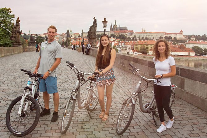 Prague E-Bike City Tour with A Local Guide - Charles Bridge and Lennon Wall add Prague’s familiar symbols