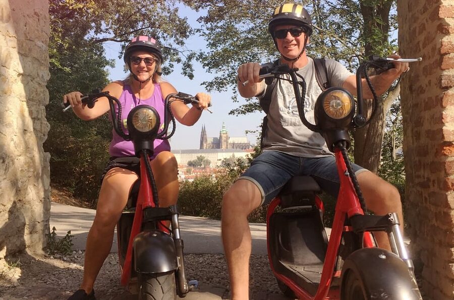 Prague Electric Scooter and eBike Grand Tour - Charles Bridge, the National Theatre, and central Prague