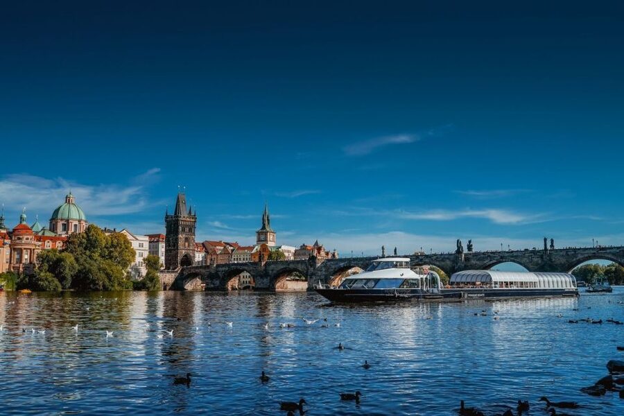 Prague: Evening Vltava River Eco Cruise with Prosecco - Under Charles Bridge, not across it