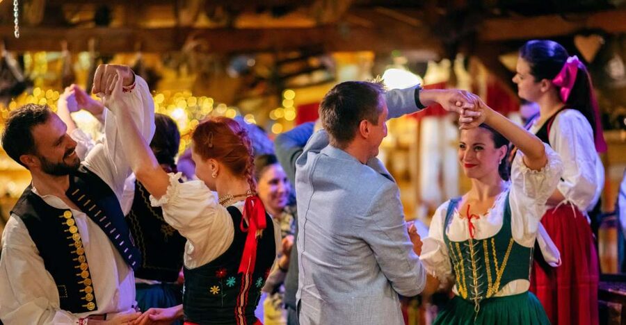 Prague: Folkloric Dinner Show with Unlimited Drinks - The welcome toast and four-course dinner