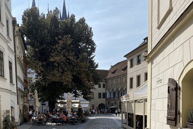 Prague in One Afternoon: Private Walking Tour with Marek - Crossing Charles Bridge with Prague in view
