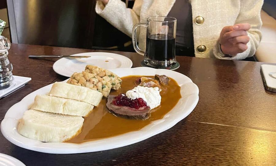 Prague: Local Food Tour in Secrets Hidden Gems - Stop two: Svíčková and the comfort of a Czech restaurant
