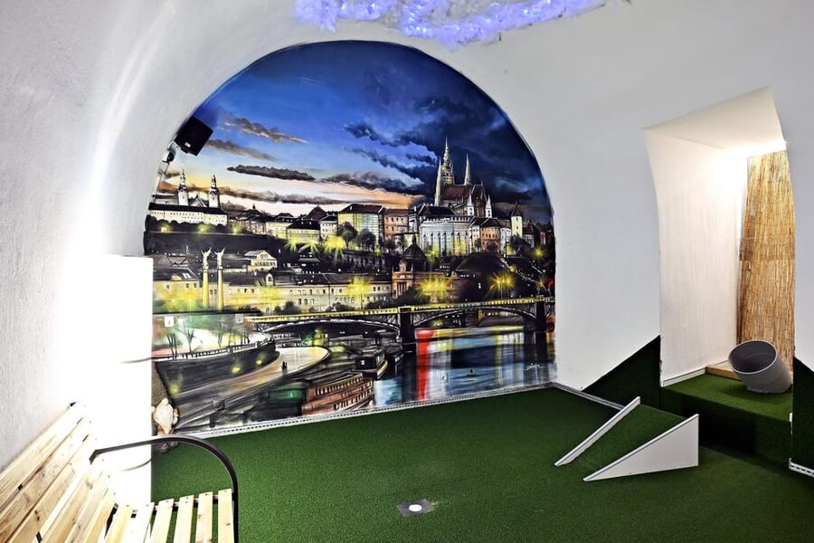 Prague: Mazemania Miniature Golf Experience - The bar and seating area change the pace