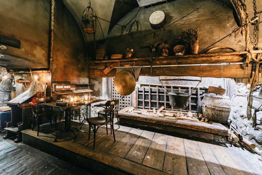 Prague: Medieval Dinner with Unlimited Drinks - Entering U Pavouka for a medieval night