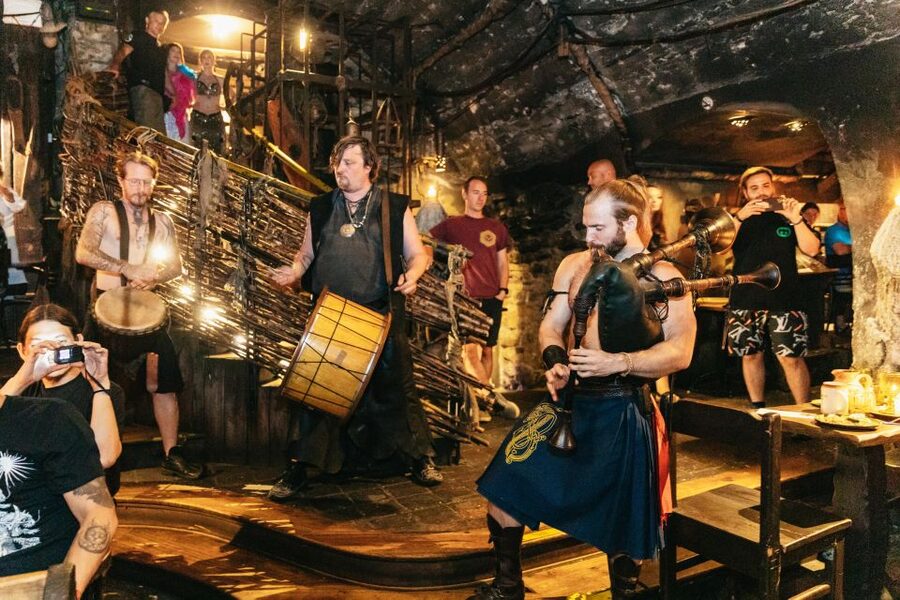 Prague: Medieval Dinner with Unlimited Drinks - Candlelight looks good, but dinner can be hard to see
