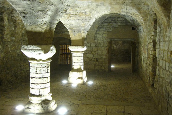 Prague Old Town, Medieval Underground and Dungeon Historical Tour - Going below street level into the medieval rooms