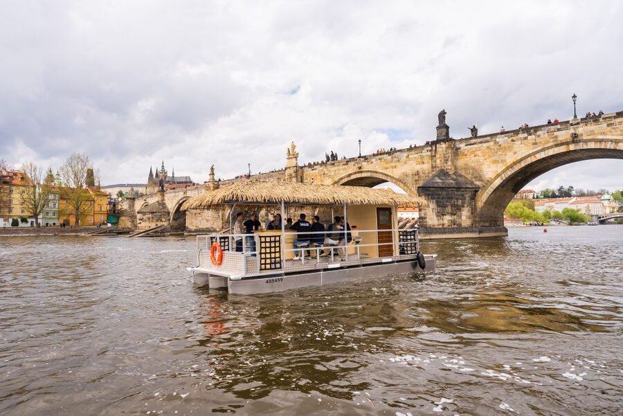 Prague: Party Tiki Boat Sightseeing Cruise with Drinks - Following the Vltava from the National Theater