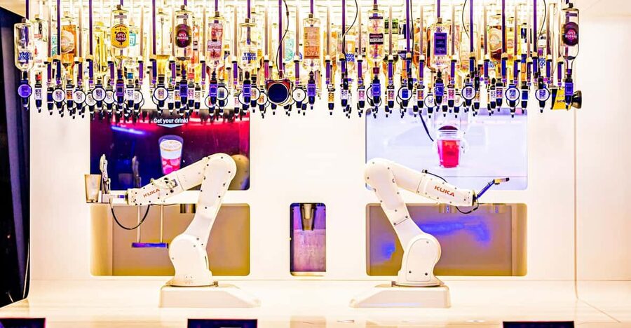 Prague: Robotic Bar Entry with a Drink Included - Watching More Than 100 Bottles Feed the Machines
