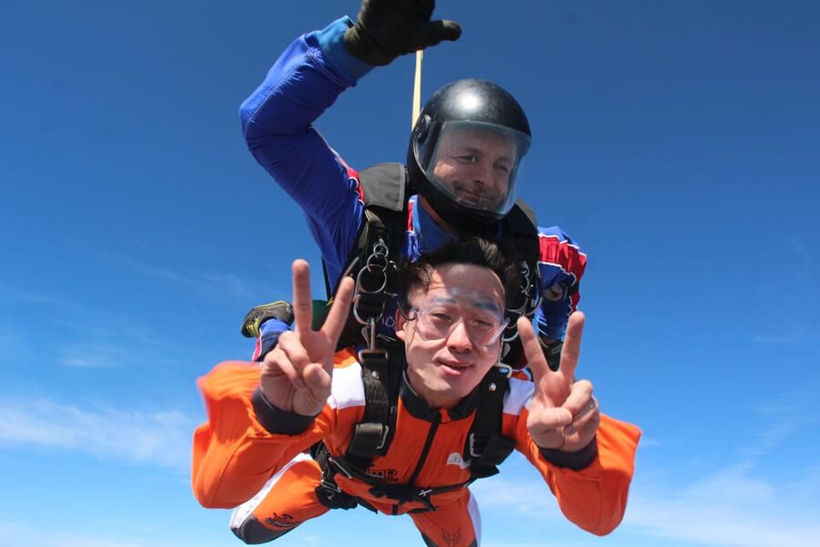 Prague: Tandem Skydiving 14,000ft over Prague with Transfers - Landing, a drink, and your media package