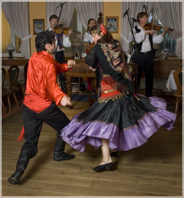 Prague: Traditional Folklore Evening with Dinner & Music - Entering the wine cellar and sitting down to dinner