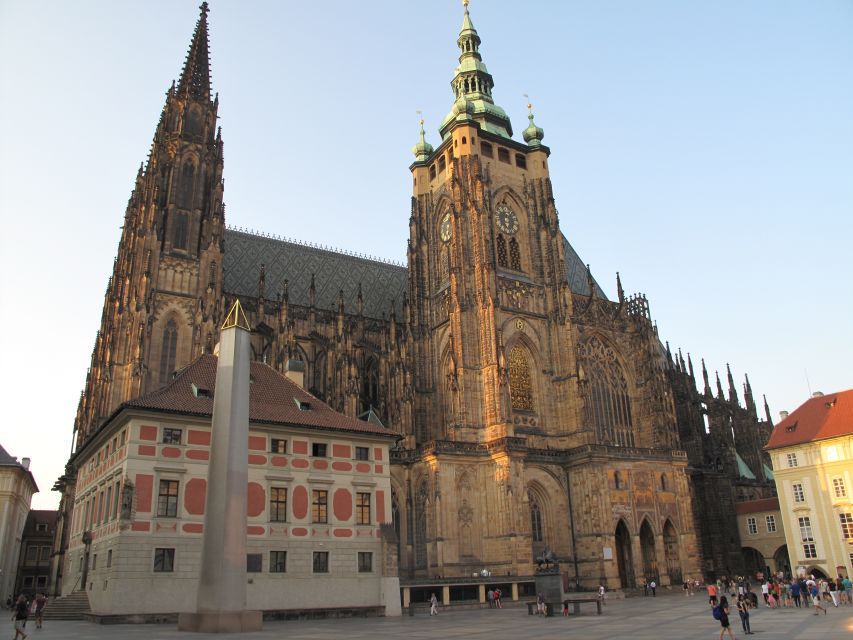 Prague: Vintage Car Ride and Walking Tour - Crossing Charles Bridge on foot