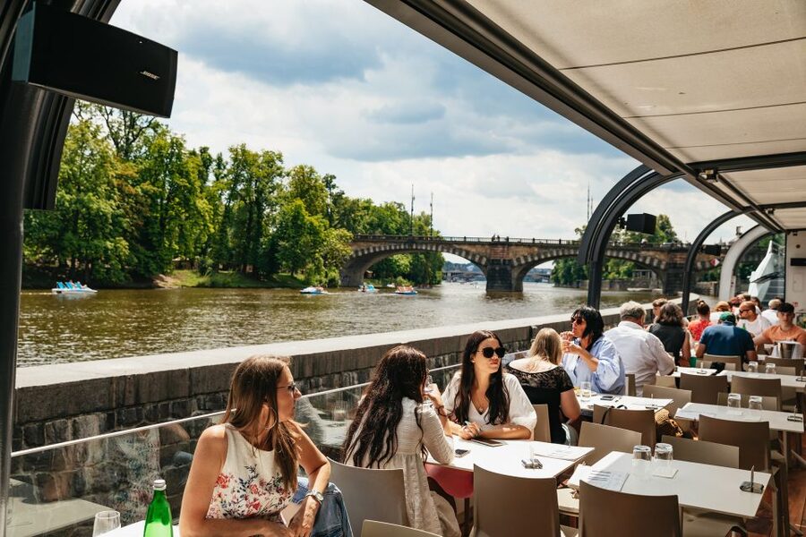Prague: Vltava River Lunch Cruise in an Open-Top Glass Boat - Charles Bridge from below
