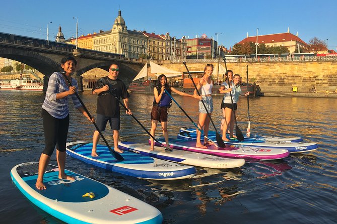 Stand-Up Paddleboarding on the Vltava River in Prague - Paddling toward Prague Castle and Charles Bridge